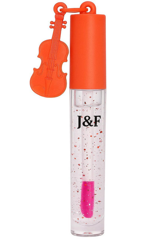 1. J & F Glitter Lip Gloss with a violin-themed orange cap, featuring a clear formula with pink glitter for a dazzling shine.

2. J & F Glitter Lip Gloss in a violin-themed orange cap, offering a clear, non-sticky formula with sparkling pink glitter.

3. J & F Glitter Lip Gloss with a unique violin cap, showcasing a clear gloss infused with pink glitter for a glamorous finish.